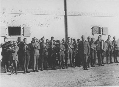 The camp orchestra perform in the Janowska concentration camp